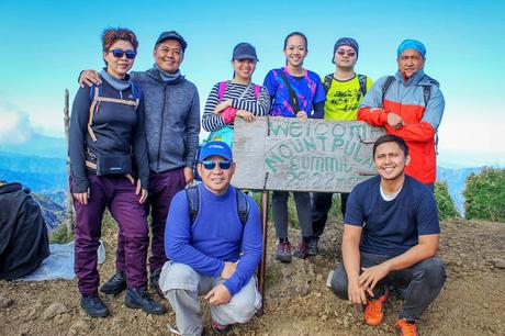 Day hike group conquering Mt. Pulag - Highest Peak