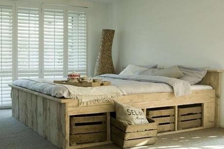 A Bed Made From Pallets and Wine Crates