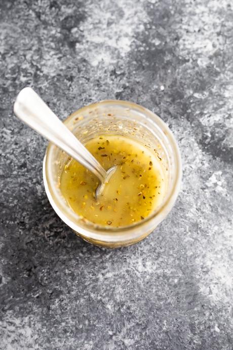 overhead view of italian dressing in a jar