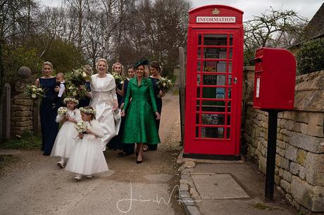 Bridal party walking to the church in Stanton, Broadway