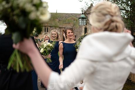 Bride greeting her Bridesmaids after the ceremony