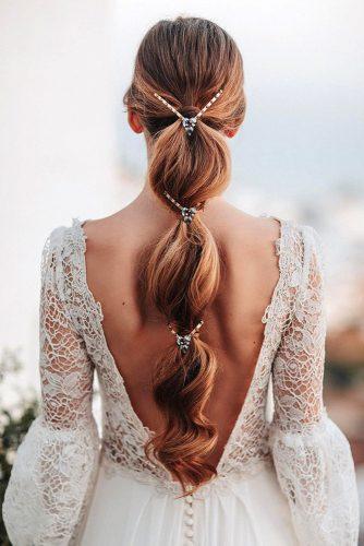 bohemian wedding look white lace dress with open back and long hair original ponytail juantrujillofoto