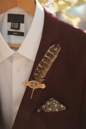 bohemian wedding look burgundy groom suit with feather vintage boutonniere emilydahl