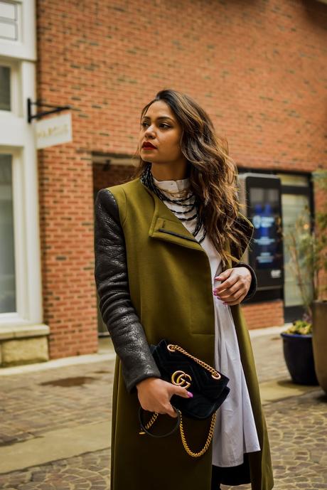 white and black outfit, necklaces stacked, neck candy, street style, black gap jeans, white tunic dress outfit, fashion, style, myriad musings, fenty beauty uncensored red lipstick, green military coat, saumya shiohare