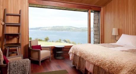 Enchanting Travels Chile Tours TierraChiloé_fachadanocturna_NSaieh