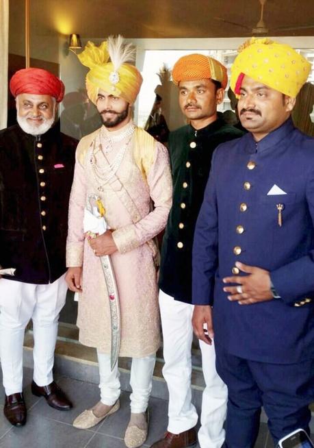 Rajkot: Indian cricketer Ravindra Jadeja with his relatives  during his wedding ceremony in Rajkot on Sunday. PTI Photo(PTI4_17_2016_000200B)