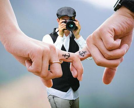 how much does a wedding photographer cost photography couple hands with tattoos