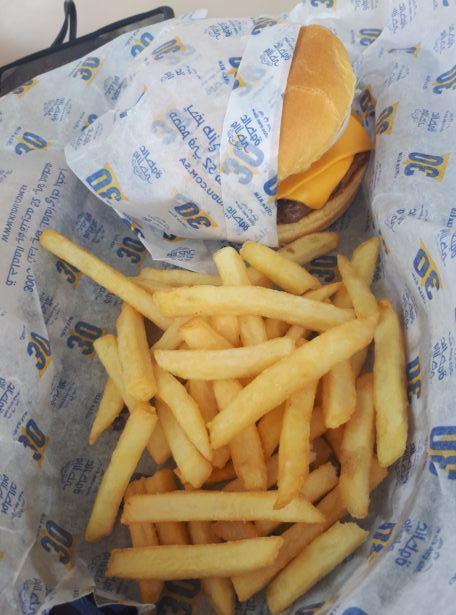 Friday’s Featured Food: Cheeseburger, Chips, Cola and Ice Cream in Kudu Fast Food Joint in Shaqra, Saudi Arabia Friday’s Featured Food: Cheeseburger, Chips, Cola and Ice Cream in Kudu Fast Food Joint in Shaqra, Saudi Arabia