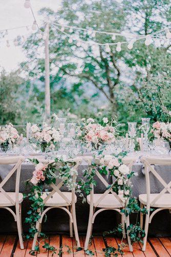 natural wedding décor reception table grey tablecloth and greenery gianlucaadovasio