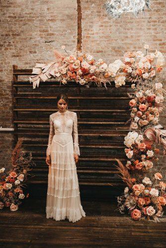 rust wedding color wooden pallette backdrop with roses and pampas grass kimberly chau photography