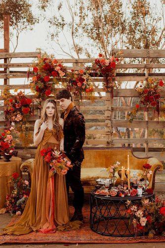 rust wedding color monochrome palette wooden crates décor with flowers and candles pacoandbetty