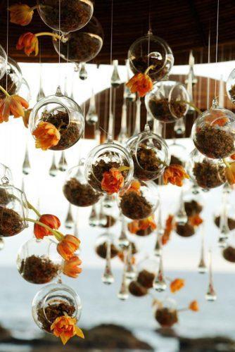 rust wedding color hanging décor glass balls with orange flowers chris + lynn photographers