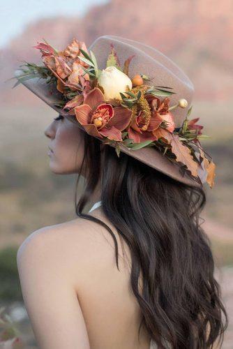 rust wedding color bohemian bridal hat with orchid flowers and greenery tylerrye_