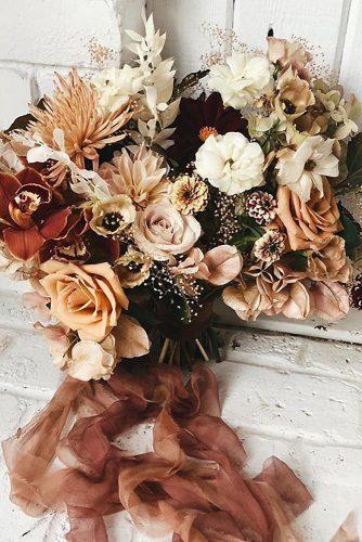 rust wedding color flower bouquet with roses and ribbons loversxsociety