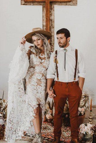 rust wedding color bohemian bridal couple with bride in lace dress and hat valeriethompsonphotography