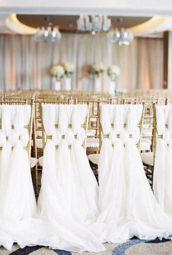 luxury wedding decor ideas tulle in chair decor Michael and Carina Photography