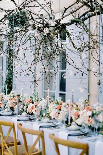 modern wedding decor ideas monochrome blue gray reception flower table runner with hanging branches and candles mat.kb