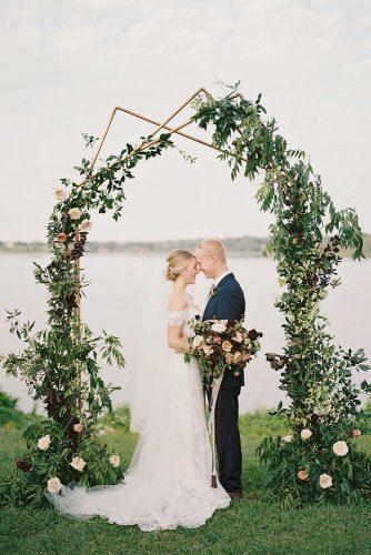modern wedding decor ideas geometry arch with greenry and flowers charla storey photography