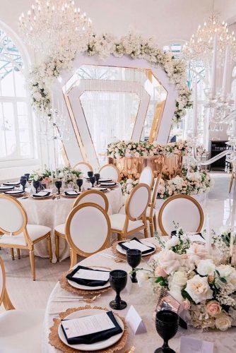 modern wedding decor ideas white gold reception with flower centerpieces and black details tamaravalenkova