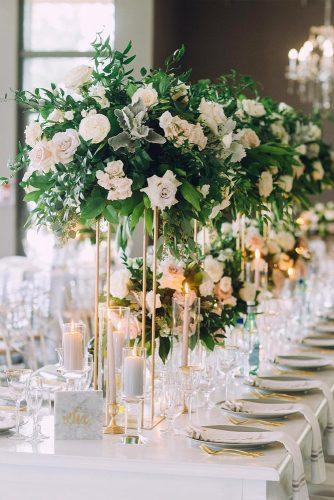 modern wedding decor ideas elegant tall centerpieces with greenery and roses on gold minimalistic stand lifeimages