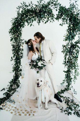 modern wedding decor ideas ceremony with greenery simple arch broom bride and their dog davis.hilton