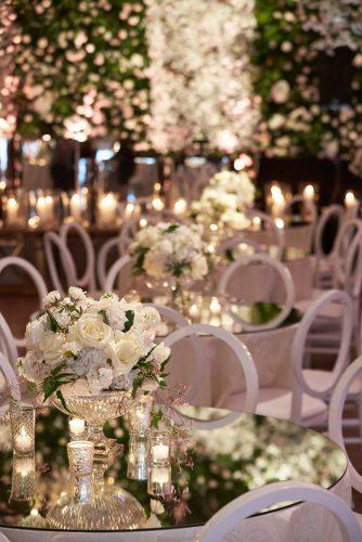modern wedding decor ideas reception with round tables with mirror surface and flower centerpiece kingen smith
