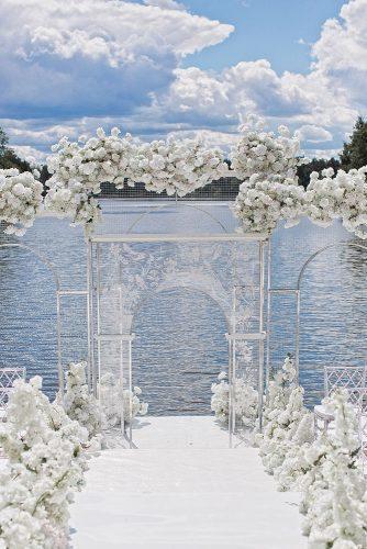 modern wedding decor ideas airy white ceremony with transparent arch akuznetshova