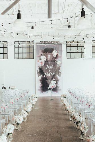 modern wedding decor ideas minimalist white gray ceremony with pink flowers on backdrop chairs and aisle avenew studios