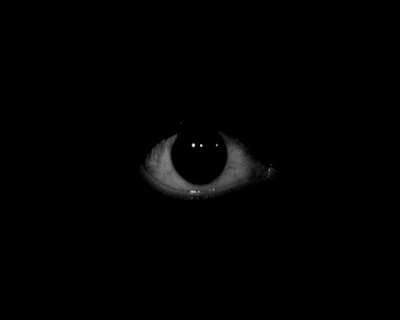 one eye with black background