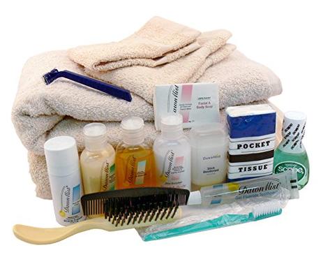 Image: Non-Profit Depot Toiletry Charity Gift Kit | Includes travel-sized toiletries: toothbrush and toothpaste, soap, shampoo, deodorant, lotion, shave cream and razor, hairbrush and comb, two washcloths, two bath towels