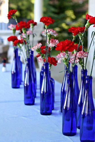 independence day wedding 4th of july red and white carnations flowers in blue bottles the lily pad cottage
