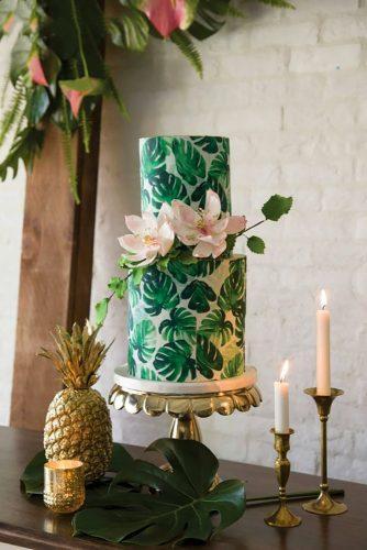 tropical wedding cake trends tripical leaf and flowers studiobaronphoto
