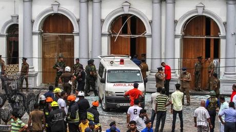 Explosions kill at least 207 in Sri Lanka; police say 13 suspects in custody