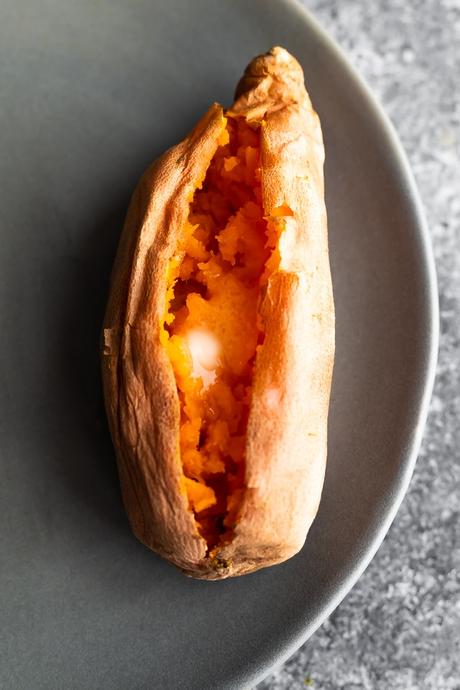 image showing cooked sweet potato on plate how to cook a sweet potato in the microwave