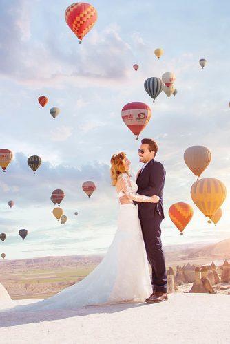 cappadocia wedding photos newlyweds in front of balloons