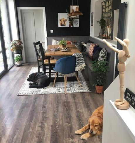 How Do You Do Comfort? two dogs on the floor in a navy and white dining room