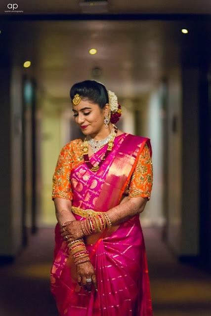 Pink Wedding Saree and Orange Blouse