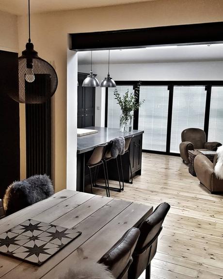 Milano Windsor Anthracite Vertical Radiator in a modern dining room.