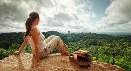 Take in the spectacular views of the ancient Mayan city of Tikal.