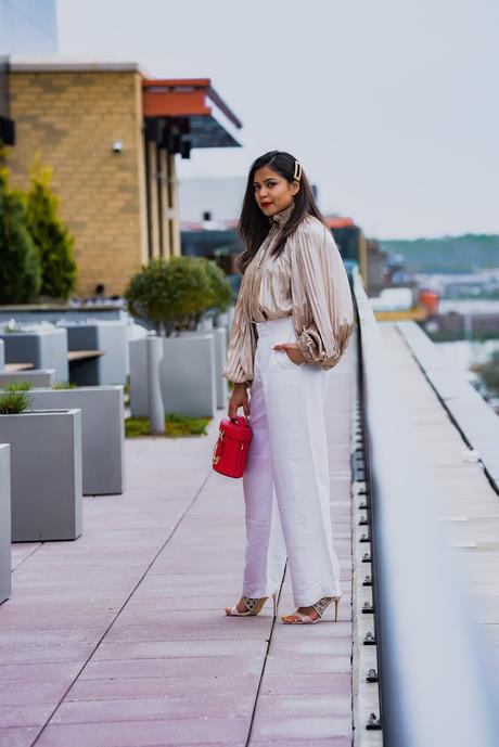 gold blouse, white jeans, party look, weddign guest, ootd, street style, dc blogger, saumya shiohare, myriad musings , rent the runway blouse, whute pants outit, red zac posen bag 