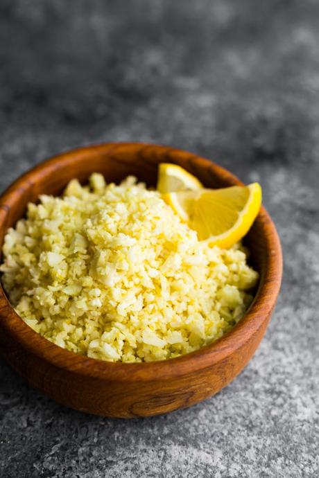 Lemon Garlic Cauliflower Rice in brown bowl