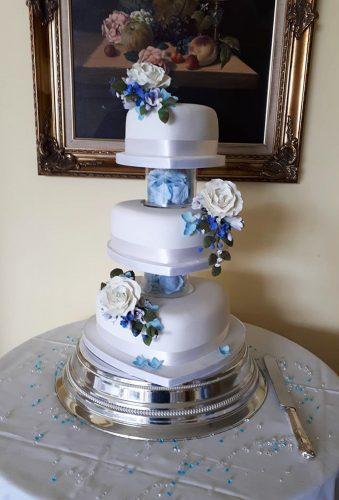 wedding cake shapes cake with blue flower occasions_cake_studio