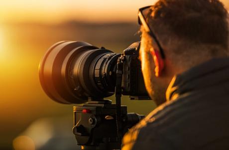 Photographer Using Camera