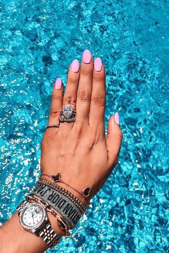 engagement ring selfie natural light selfie behind the pool