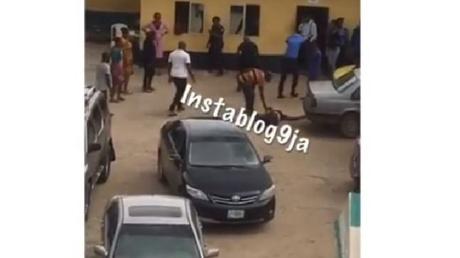 Armed robber killed after chasing pastor to a police station (WATCH VIDEO)