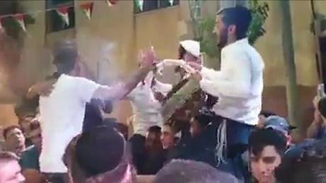Modiin Ilit residents join wedding celebrations in Palestinian village