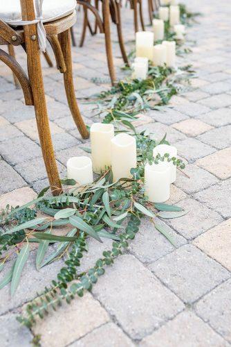 rustic wedding ideas aisle with candles and greenery kiel rucker photography