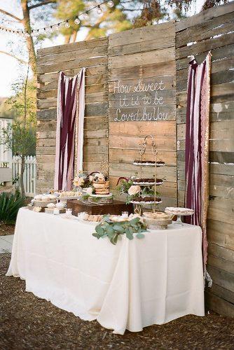 rustic wedding ideas dessert table decorated with pallets and signs acres of hope photography