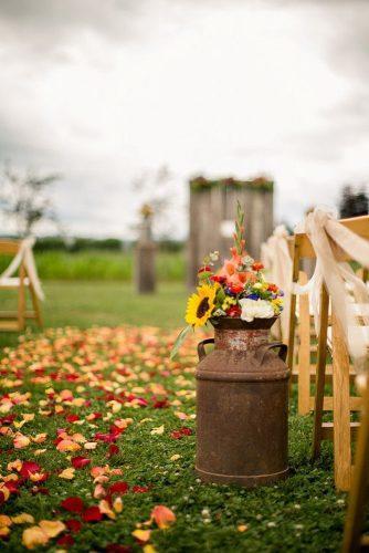 rustic wedding ideas bridal aisle decorated with wildflowers genesa richards photography