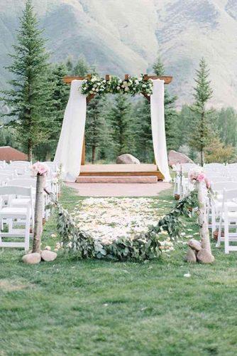 rustic wedding ideas outdoor ceremony with white cloth and greenery kate holstein